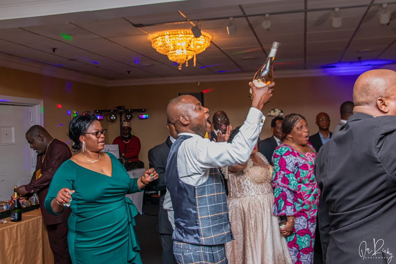 Members dancing and celebrating