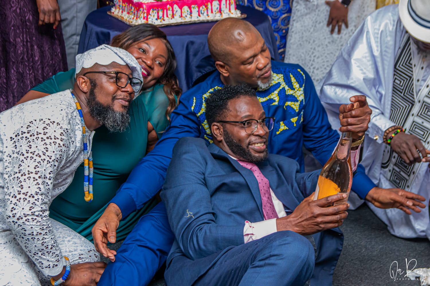 Friends laughing and toasting together